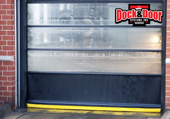 High-speed door installed at a car wash bay entrance