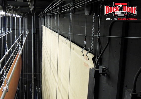 Fire curtain rigging viewed from above a stage