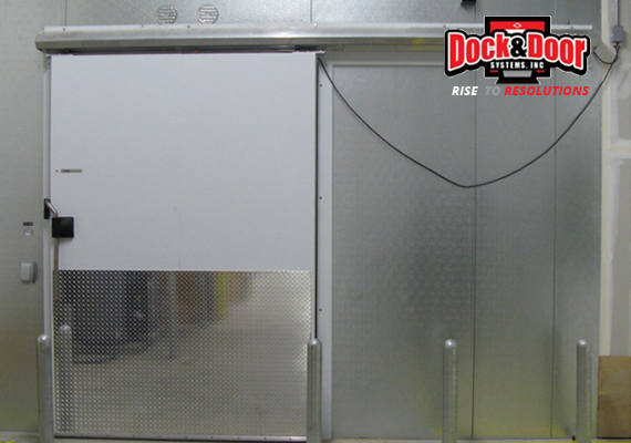 Single sliding metal-track cooler door on a wall-mounted track