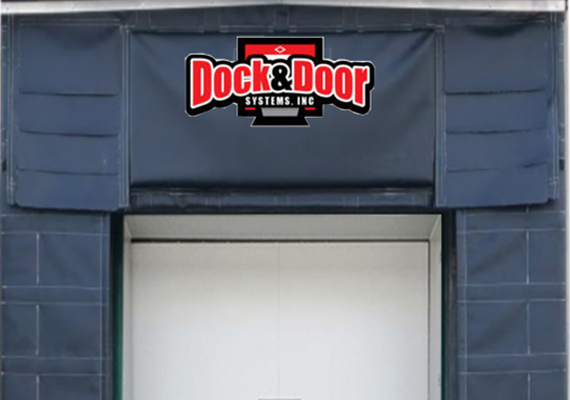 Vertical rise fiberglass door with a fabric storm hood above the opening