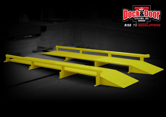Pair of yellow steel wheel riser ramps