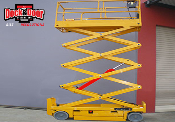 Yellow scissor lift platform raised